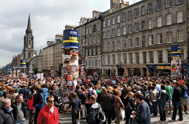 Crowds gathering at the Edinburgh Festival on the Royal Mile, highlighting why Edinburgh is celebrated as one of the Best Cities in the UK.