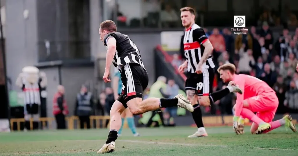 Grimsby Town vs Crewe Alexandra – a Grimsby striker fires past the Crewe goalkeeper at Blundell Park | The London Magazine